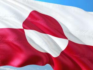 Det grønlandske flag Erfalasorput - rød og hvid cirkel på hvid og rød baggrund